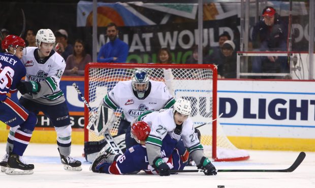 Seattle's Ryan Gottfried fights for the puck during the Thunderbirds loss at Spokane. (Larry Brunt/...