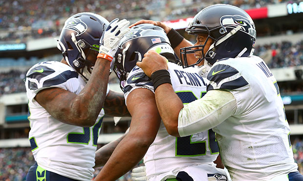 Seahawks Rashaad Penny, Chris Carson, Russell Wilson...