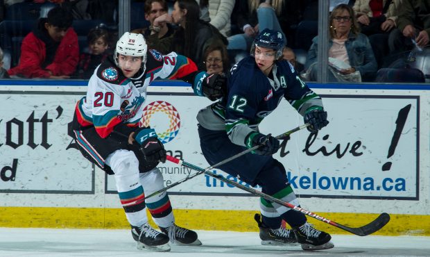 Kelowna Rockets center Matthew Wedman clashes with former teammate Henrik Rybinski during the Thund...