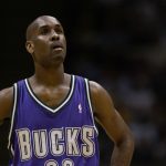 Gary Payton looks on