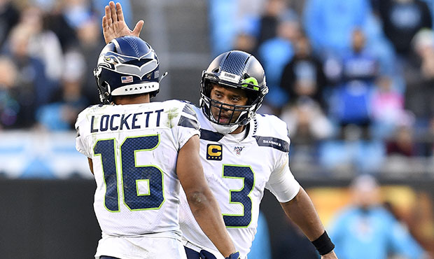 Seahawks WR Tyler Lockett, QB Russell Wilson...