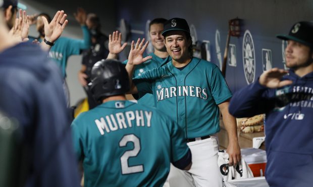 SEATTLE, WASHINGTON - SEPTEMBER 10: Marco Gonzales #7 high fives Tom Murphy #2 of the Seattle Marin...