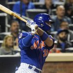 
              New York Mets' Michael Conforto hits an RBI single during the fourth inning of a baseball game against the Miami Marlins, Thursday, Sept. 30, 2021, in New York. (AP Photo/Frank Franklin II)
            