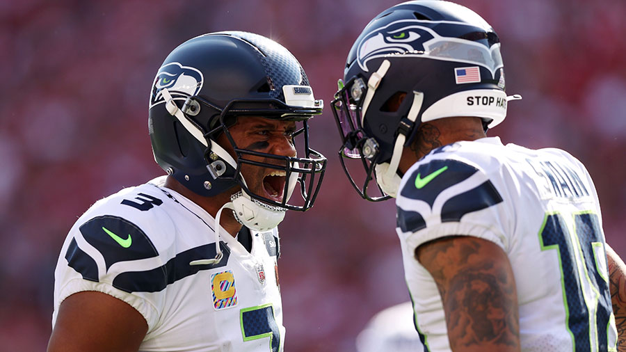Seahawks Russell Wilson, Freddie Swain...