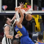 Jokic posts 32 points, 16 boards; Nuggets top Spurs 102-96