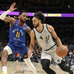 Jokic posts 32 points, 16 boards; Nuggets top Spurs 102-96