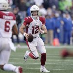 
              Arizona Cardinals quarterback Colt McCoy scrambles against the Seattle Seahawks during the first half of an NFL football game, Sunday, Nov. 21, 2021, in Seattle. (AP Photo/Ted S. Warren)
            