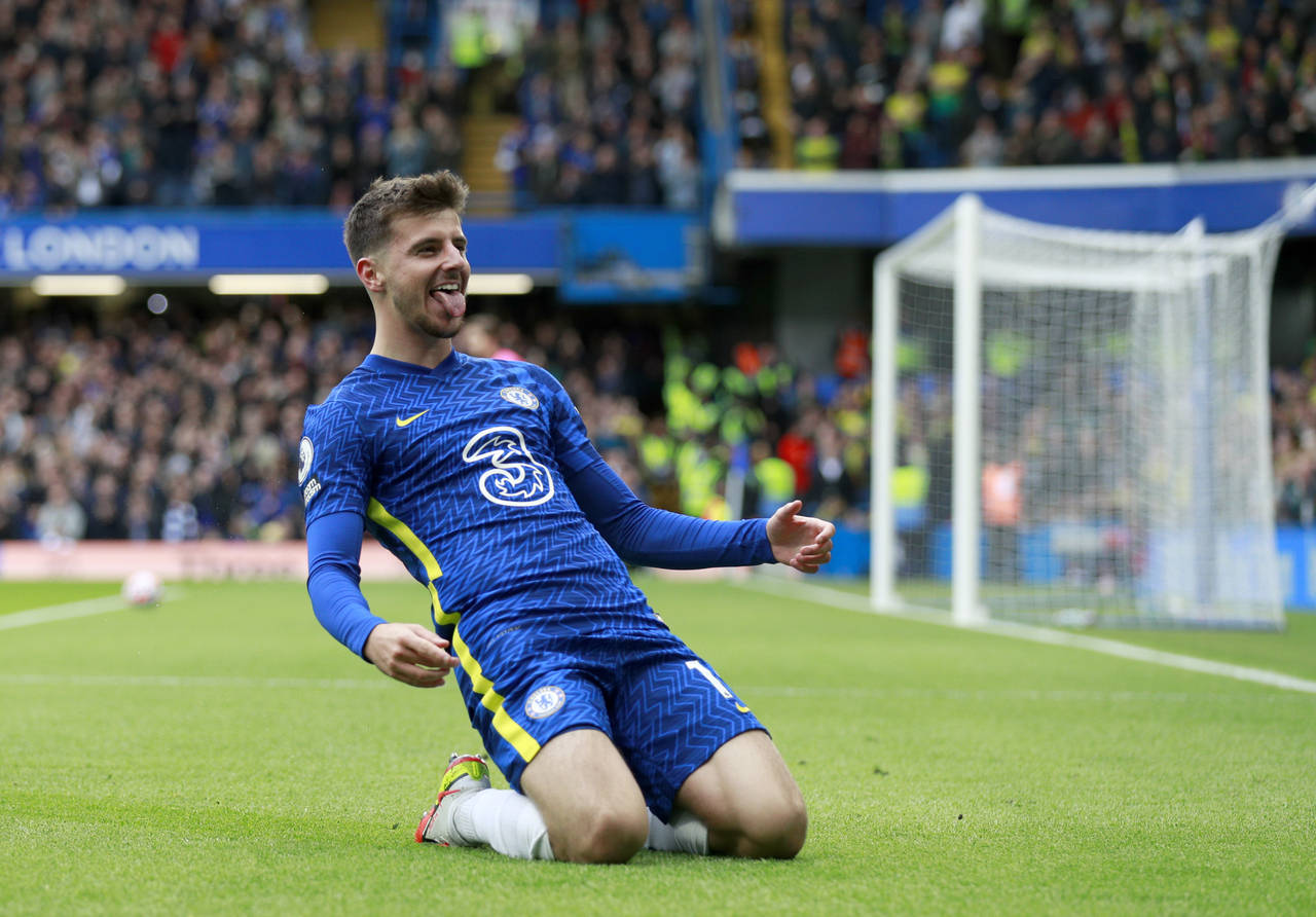 Chelsea's Mason Mount celebrates after scoring his side's opening goal during the English Premier L...