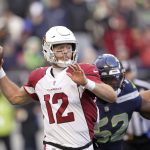 
              Arizona Cardinals Colt McCoy throws against the Seattle Seahawks during the second half of an NFL football game, Sunday, Nov. 21, 2021, in Seattle. (AP Photo/Ted S. Warren)
            
