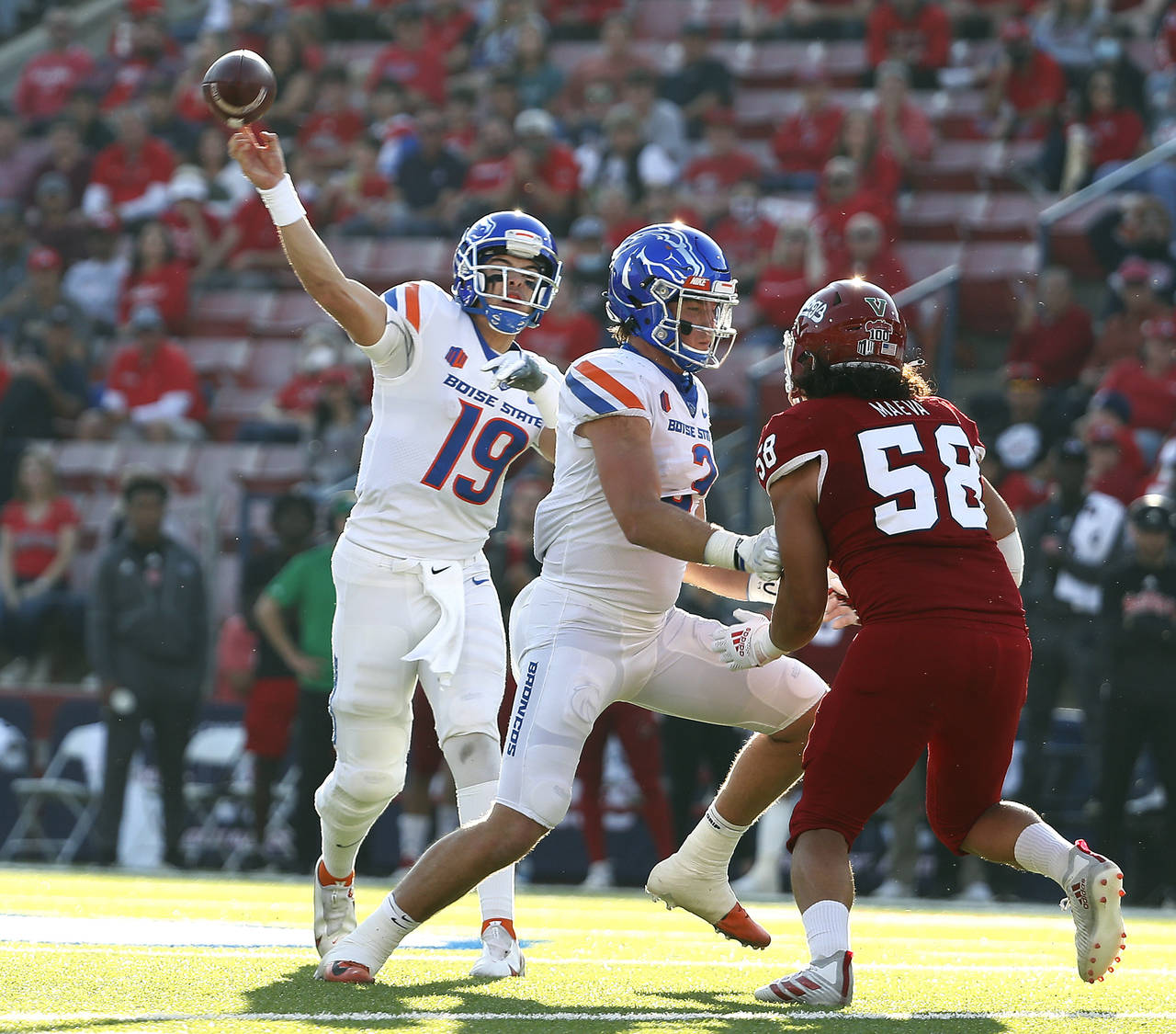 Boise State quarterback Hank Bachmeier drops back and passes against Fresno State during the first ...