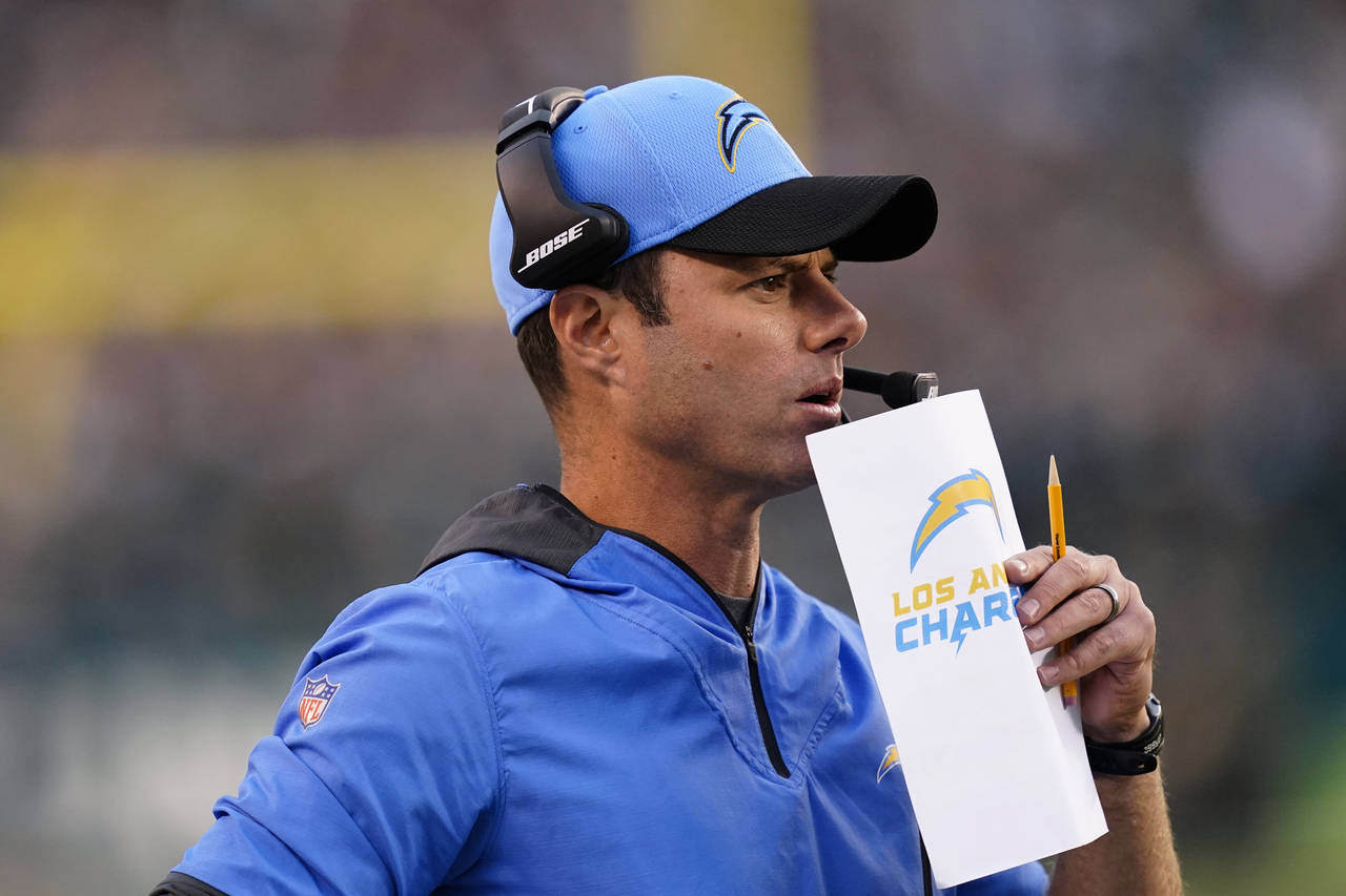 Los Angeles Chargers head coach Brandon Staley watches action during the first half of an NFL footb...