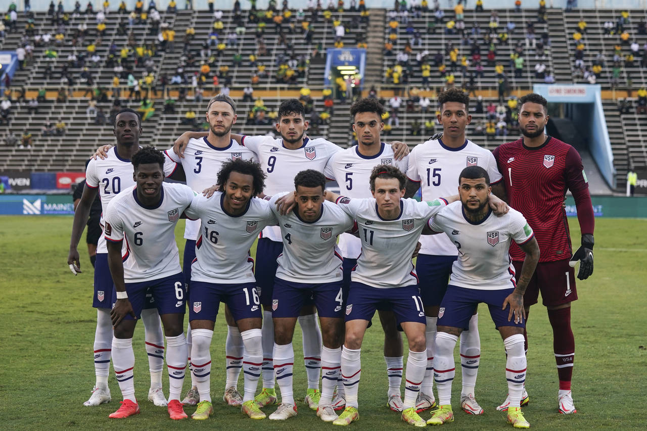 United States' players pose for a group photo prior to a qualifying soccer mtch against Jamaica for...