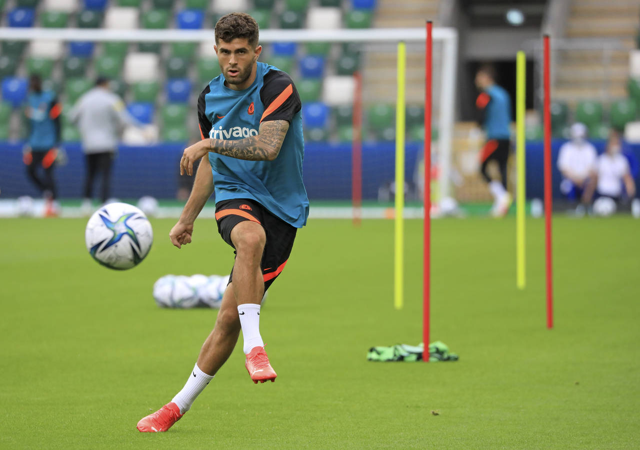 FILE - In this Aug. 10, 2021 file photo, Chelsea's Christian Pulisic kicks the ball during a traini...