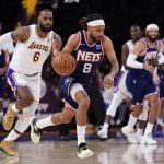 Claxton oops over James late, Nets hold off Lakers 122-115