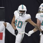 Waddle shines, Dolphins beat Saints 20-3 to win 7th straight