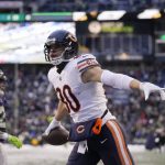 
              Chicago Bears tight end Jimmy Graham reacts after scoring a touchdown on a pass reception in the end zone against the Seattle Seahawks during the second half of an NFL football game, Sunday, Dec. 26, 2021, in Seattle. The Bears won 25-24. (AP Photo/Stephen Brashear)
            