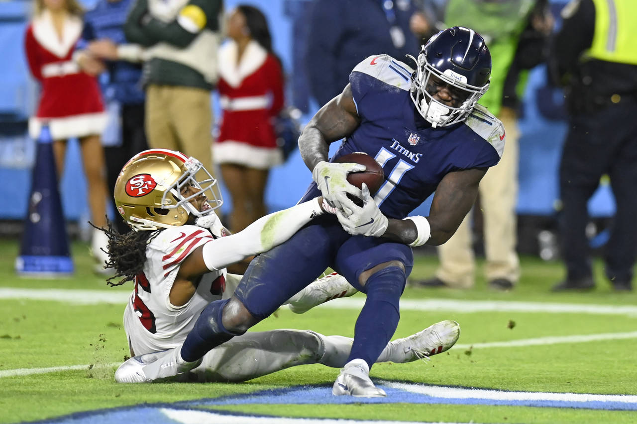 Tennessee Titans wide receiver A.J. Brown (11) catches a touchdown pass as he is defended by San Fr...