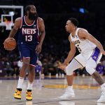 Claxton oops over James late, Nets hold off Lakers 122-115