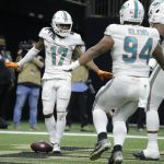 Waddle shines, Dolphins beat Saints 20-3 to win 7th straight
