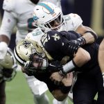 Waddle shines, Dolphins beat Saints 20-3 to win 7th straight