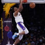 Claxton oops over James late, Nets hold off Lakers 122-115