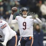 
              Chicago Bears quarterback Nick Foles (9) readies a throw against the Seattle Seahawks during the second half of an NFL football game, Sunday, Dec. 26, 2021, in Seattle. (AP Photo/Lindsey Wasson)
            