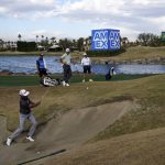 Cantlay fights through gusting wind, leads American Express