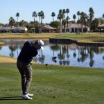 Cantlay fights through gusting wind, leads American Express