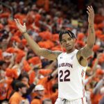 
              Auburn guard Allen Flanigan (22) reacts after a score during the second half of an NCAA college basketball game against Kentucky Saturday, Jan. 22, 2022, in Auburn, Ala. (AP Photo/Butch Dill)
            