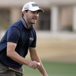 Cantlay fights through gusting wind, leads American Express