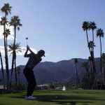 Cantlay fights through gusting wind, leads American Express