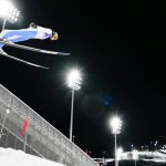 Slovenia wins Olympic debut of ski jumping mixed team