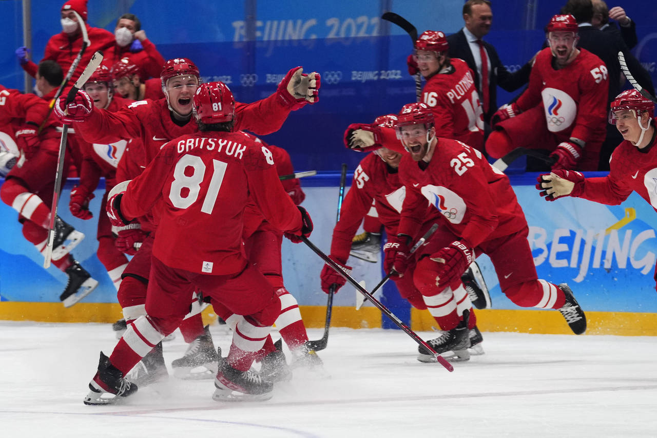 The Russian Olympic Committee celebrates the winning goal during a shootout by Arseni Gritsyuk (81)...
