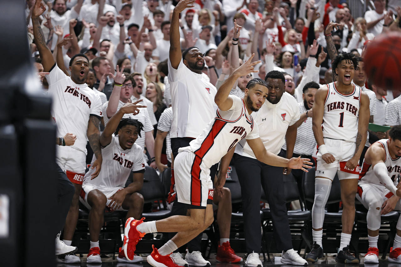 Texas Tech's Kevin Obanor (0) celebrates after scoring a 3-point shot during the second half of an ...