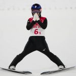 Slovenia wins Olympic debut of ski jumping mixed team event