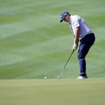 Live updates: DeChambeau ends sloppy match with a halve