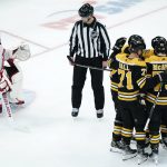 Bruins bust out for 8-1 victory over Devils as Rask honored