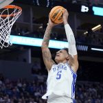 
              Duke forward Paolo Banchero (5) dunks against Texas Tech during the first half of a college basketball game in the Sweet 16 round of the NCAA tournament in San Francisco, Thursday, March 24, 2022. (AP Photo/Marcio Jose Sanchez)
            