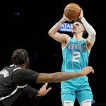 Ball scores 33 points, Hornets spoil Irving's home debut