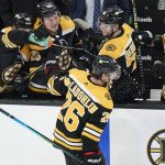 Bruins bust out for 8-1 victory over Devils as Rask honored