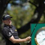 Live updates: DeChambeau ends sloppy match with a halve