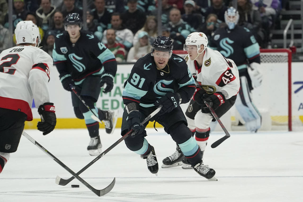 Seattle Kraken right wing Daniel Sprong (91) skates in front of Ottawa Senators left wing Parker Ke...