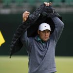 Scheffler survives wild, windy cold day to lead Masters by 3