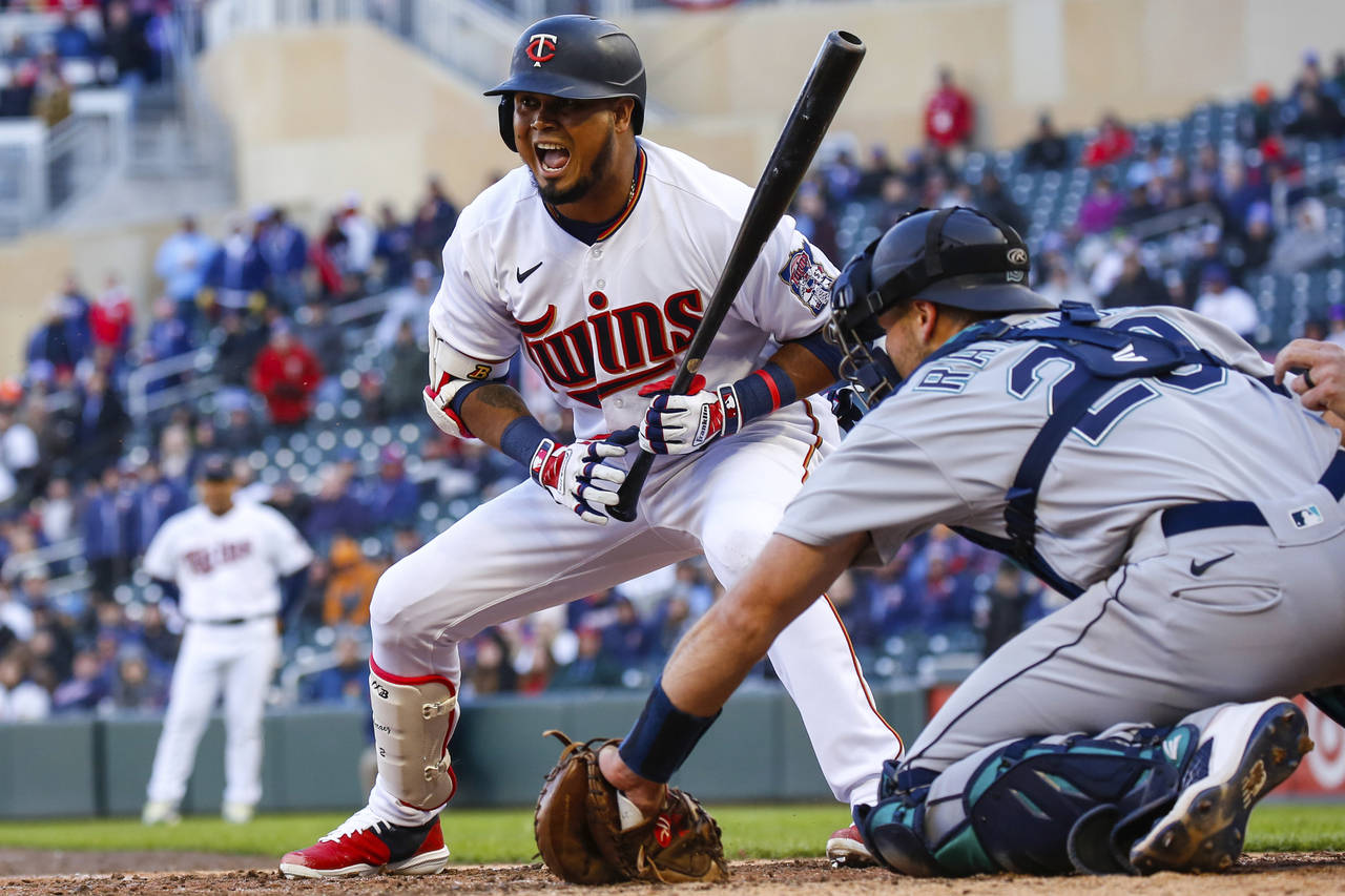 Minnesota Twins' Luis Arraez reacts after a strike during the ninth inning of the team's baseball g...