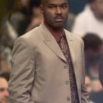 
              FILE - Miami Heat guard Tim Hardaway looks out into the crowd during a timeout in the first quarter in a game against the Atlanta Hawks Wednesday, Nov. 24, 1999 at the Miami Arena in Miami.  NBA stars Manu Ginobili and Tim Hardaway are among five new  Basketball Hall of Fame inductees. Also selected this year were WNBA great Swin Cash, former NBA coach George Karl and long-time college coach Bob Huggins. They will be enshrined into the Naismith Memorial Basketball Hall of Fame in Springfield, Massachusetts, on Sept. 10, 2022. (AP Photo/Wilfredo Lee, File)
            