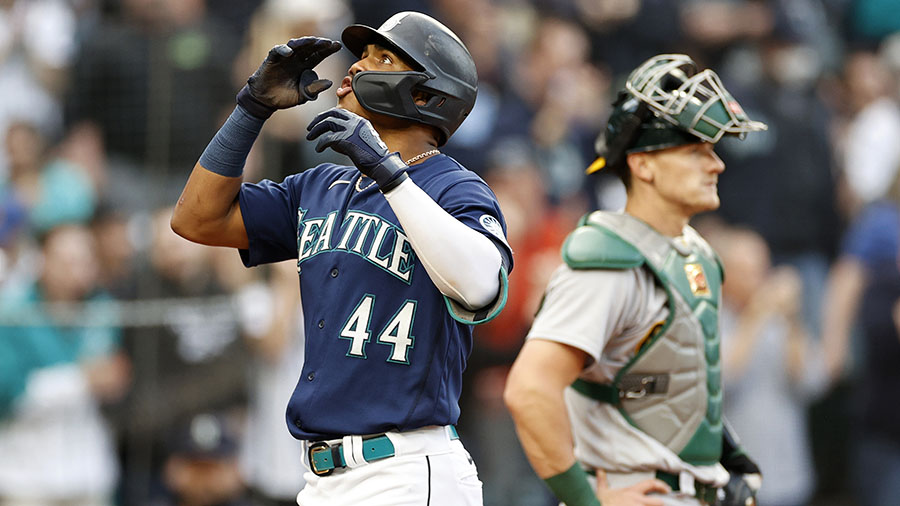 Julio Rodriguez celebrates his three-run home run against the Athletics at T-Mobile Park. (Steph Ch...