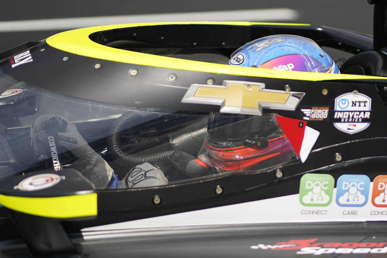 Stefan Wilson, of England, leaves the pits during practice for the Indianapolis 500 auto race at In...