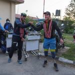 Hundreds of Everest climbers begin to return from summit
