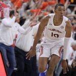 
              FILE - Auburn forward Jabari Smith (10) reacts after making a 3-pointer against Alabama during the first half of an NCAA college basketball game Tuesday, Feb. 1, 2022, in Auburn, Ala. Houston, Detroit and Orlando share the best odds to win the draft lottery on Tuesday, May 17, 2022, and the No. 1 pick in the NBA draft. All three are already loaded with young players, even before the possibility of adding someone like Chet Holmgren, Paolo Banchero or Jabari Smith. (AP Photo/Butch Dill, File)
            