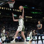 
              Seattle Storm forward Breanna Stewart (30) grabs a rebound next to Chicago Sky forward Candace Parker, right, during the first half of a WNBA basketball game Wednesday, May 18, 2022, in Seattle. (AP Photo/Ted S. Warren)
            